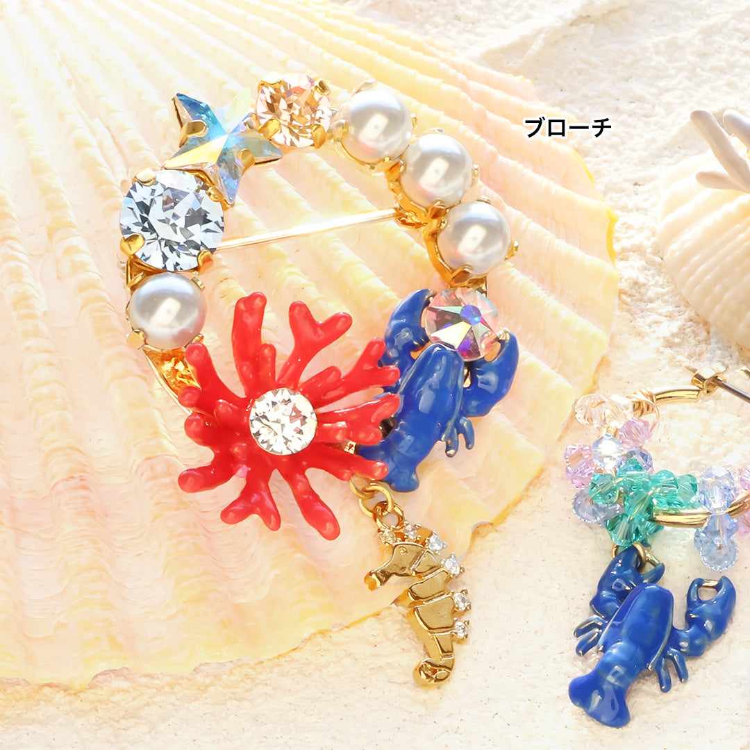 材料表No.ER0351 チャームロブスターと貴和クリスタルのアクセサリー3種