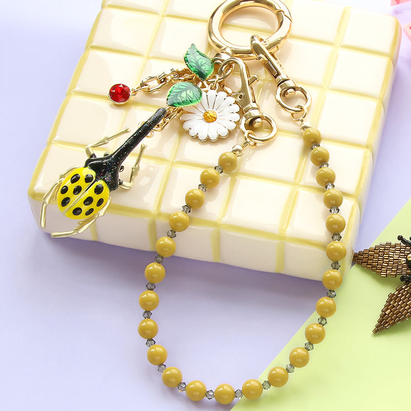 Recipe No.KR1361 2 types of botanical bag charms made from Spanish parts