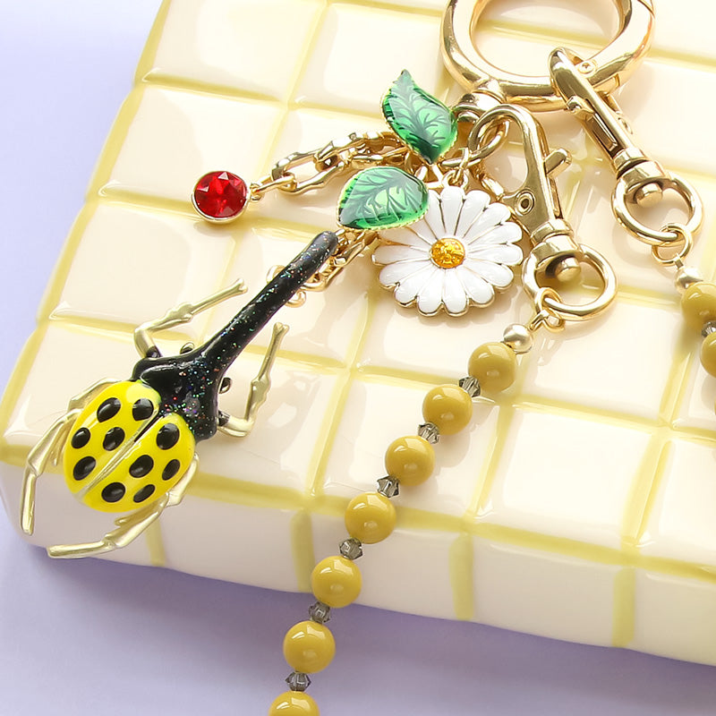 Recipe No.KR1361 2 types of botanical bag charms made from Spanish parts