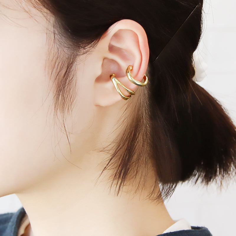 Ear cuff double deformation gold