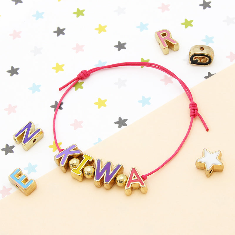 メタルパーツ イニシャル エポ付 F　ゴールド(レッド系)
